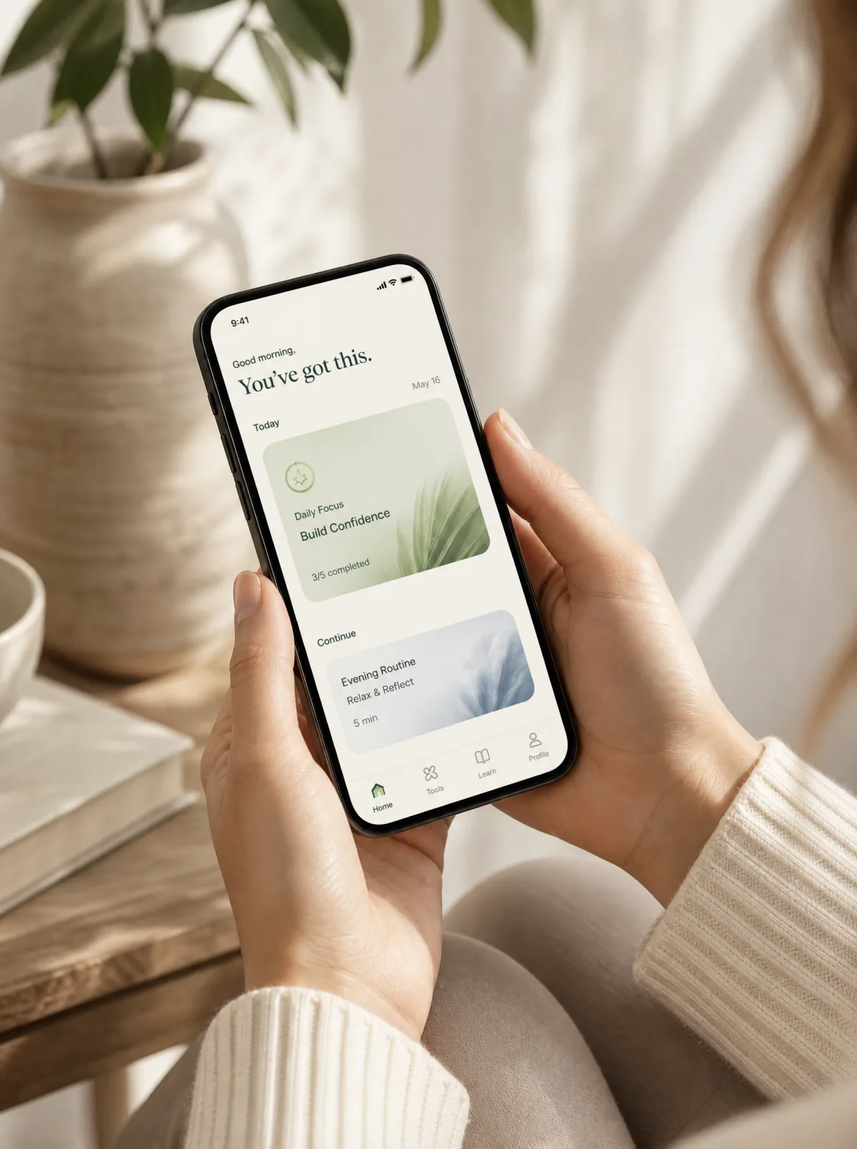 The Vivra app open on a phone, showing today's focus and evening routine